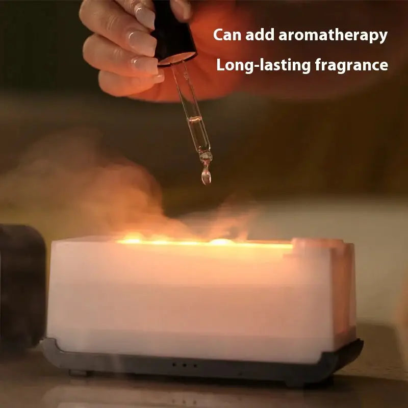 Aromatherapy diffuser with essential oil dropper.